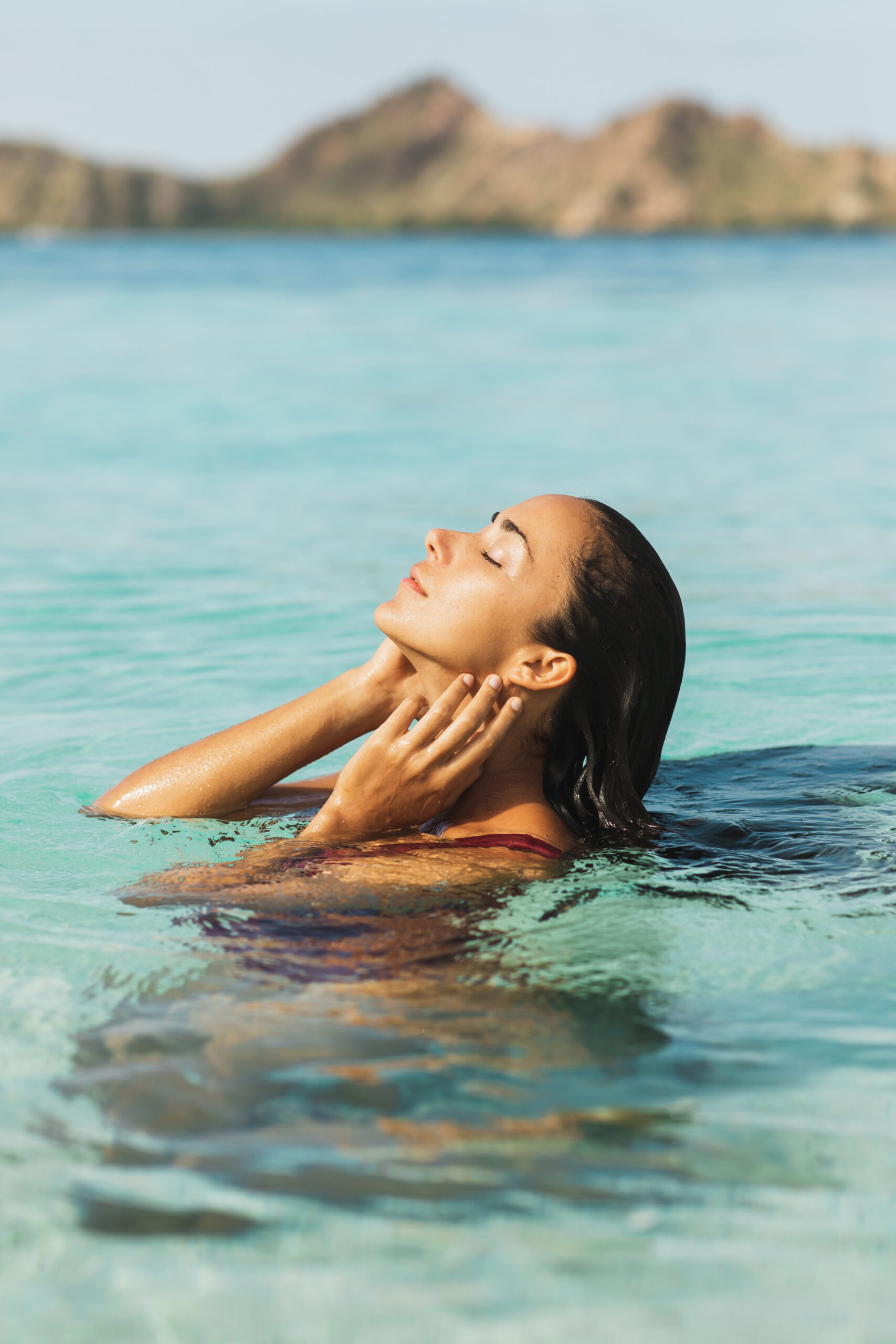 Portrait,Of,Young,Woman,Enjoying,And,Relaxing,In,Clean,Transparent